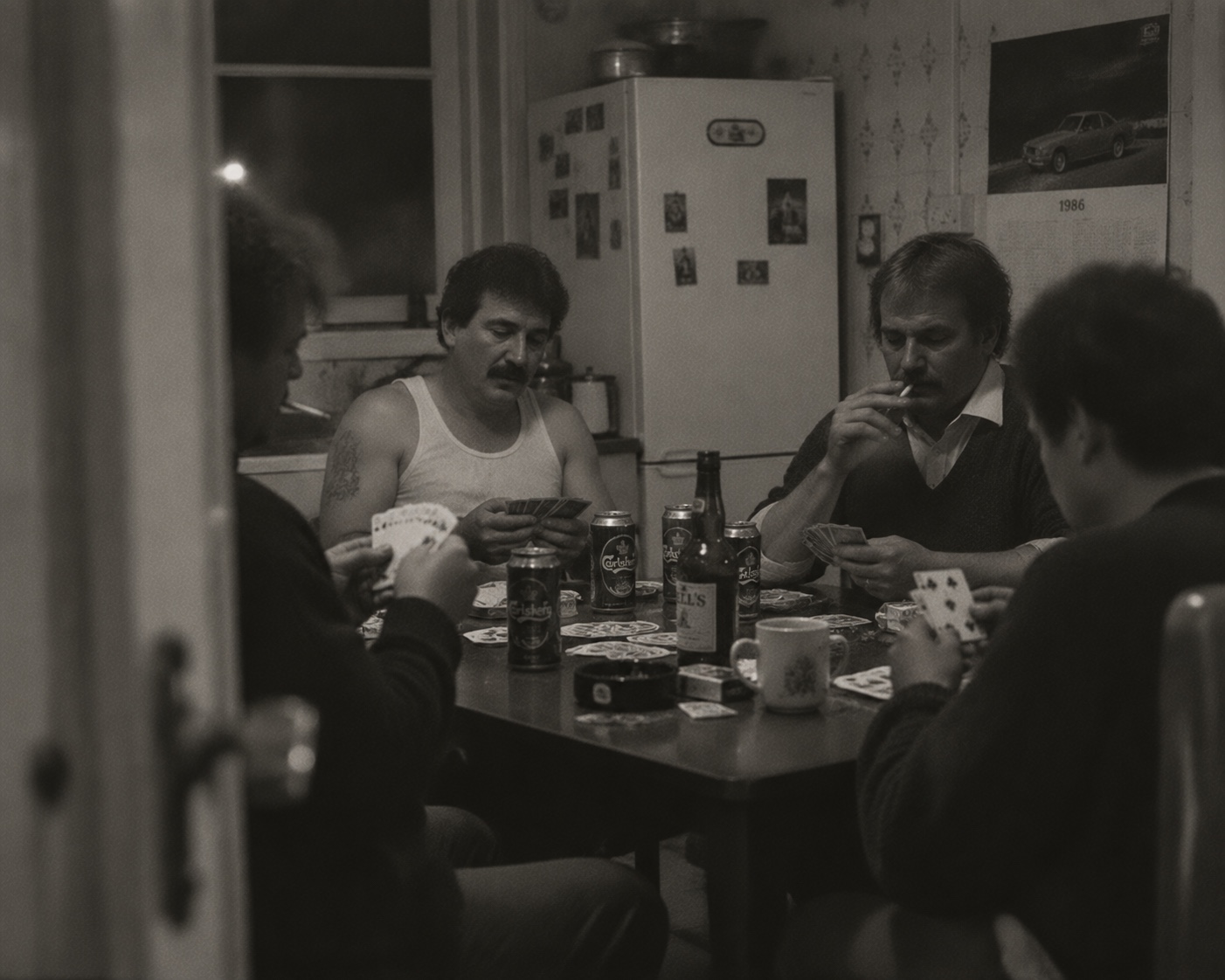 Men playing cards around a kitchen table